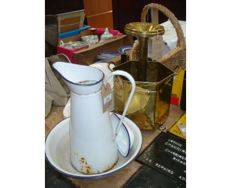 An Art deco brass smokers companion, an octagonal brass planter on paw feet, an enamelled jug, bowl and dish.