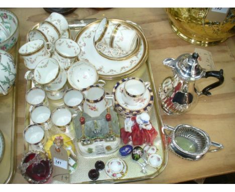 A 19th Century part tea service decorated with a gilt Greek key pattern border and rose garlands, a cobalt blue and rose patt
