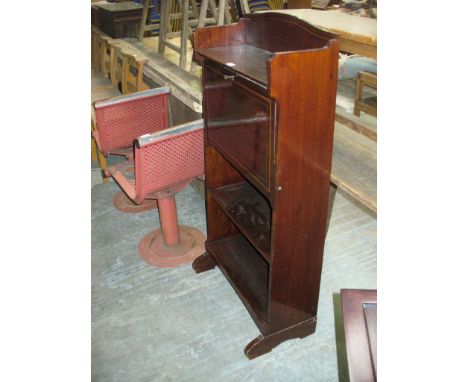 An Edwardian inlaid mahogany bureau with a rectangular galleried top above a fall front and an open shelf.