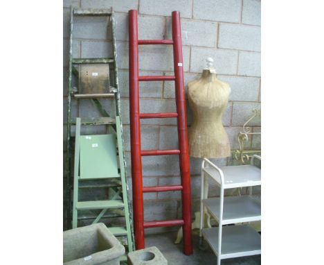 A Red bamboo ladder.