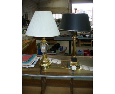 A Modern gilt metal column table lamp and a second modern lamp with a glass vase shaped column. (2)