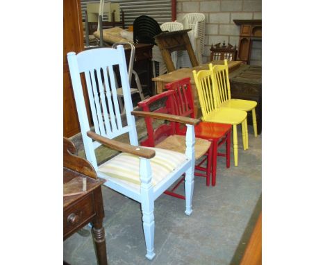 A Pair of painted stick back kitchen chairs, a painted chapel chair , rush seated chair and elbow chair. (5)