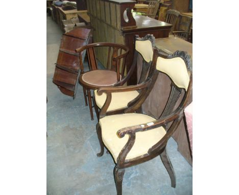 An Edwardian stained beech wood parlour elbow chair with a pierced splat back , a conforming side chair, an Edwardian inlaid 