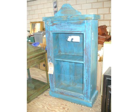 A Painted country French style hardwood cabinet with a single glazed door and an enclosed shelf.