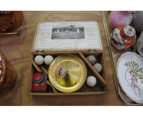 A boxed vintage Burgess garden golf set.