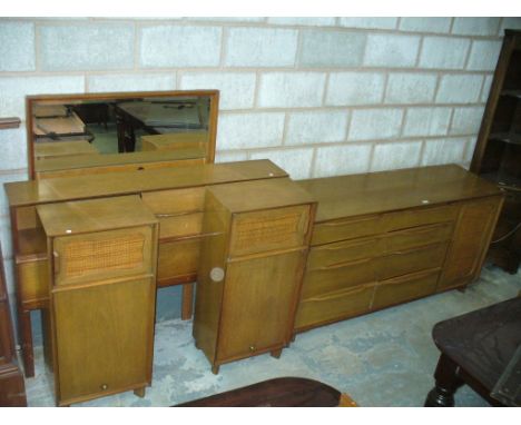 A 1960's / 70's  American "Hickory  Furniture " mahogany sideboard with an arrangement of eight drawers and a wicker panelled