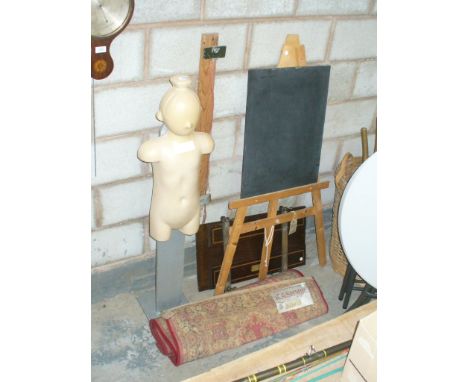 A Child's mannequin on stand , a chalk board and easel, press and two Kashmir wool rugs.