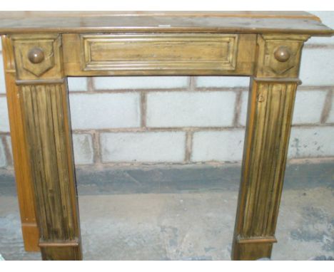 A Stained pine fire surround.