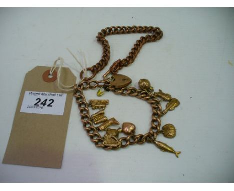 A 9ct Gold chain link bracelet with a collection of gold coloured  charms and a gold coloured bracelet.