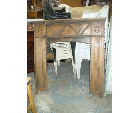 A 19th Century pine fire surround.