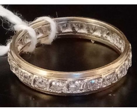 A FULL ETERNITY RING SET IN 9ct - SIZE 'O'
