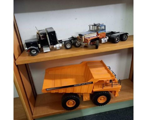 4 SHELVES OF MODEL PLASTIC LORRIES - PLAY WORN 