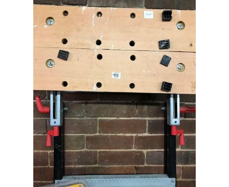 ADJUSTABLE WORK BENCH