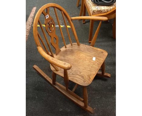 CHILD'S WOODEN ROCKING CHAIR POSSIBLY ERCOL