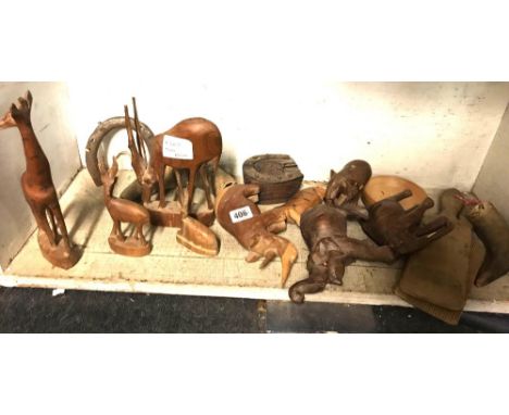 SHELF OF WOODEN CARVED ANIMALS 