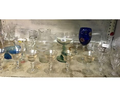 SHELF OF GLASSWARE, INCL; WINE GLASSES, BLUE BOWL ETC