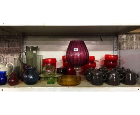 SHELF OF COLOURED GLASSWARE INCL; JUGS, GLASSES, VASES ETC