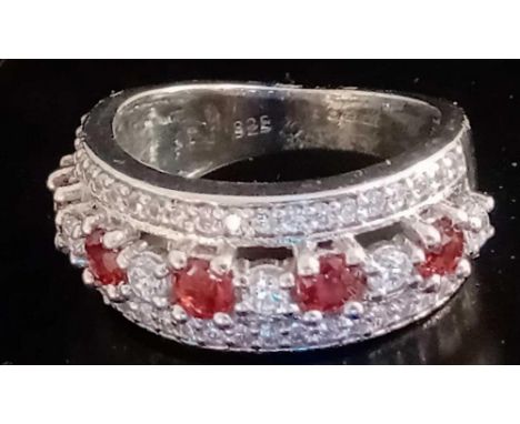 SILVER HALF ETERNITY RING (RED STONES)