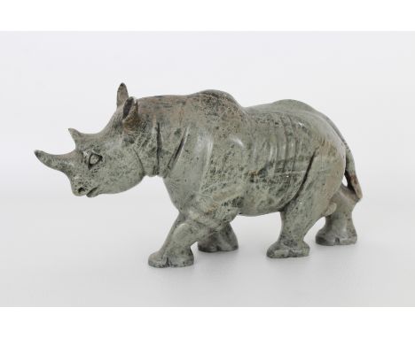 Vintage Carved Stone Rhinoceros. Appears to be unsigned. Dimensions: 3.5 x 7.75 in.