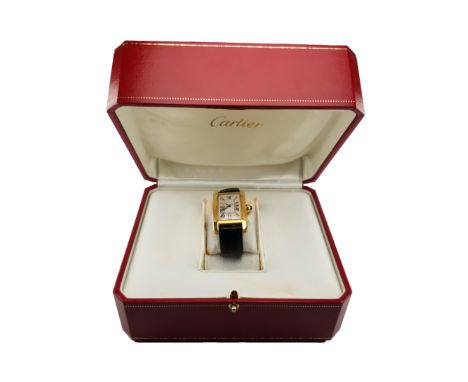 Cartier 18K Gold Tank Americaine. Medium Model. Comes with original box and booklet. Case dimensions: 41.6 mm x 22.6 mm Refer