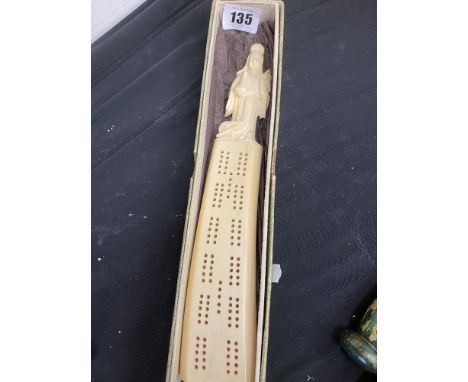 A Walrus tusk cribbage board