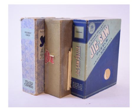 A Chad Valley Jig-Saw puzzle, Connemara, three others, a picnic set, glass, flatware, a small revolving bookcase and other it