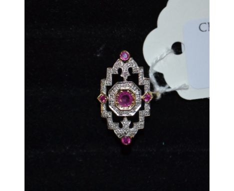 An Art Deco style 9ct gold ruby and diamond panel ring, approx. ring size Q