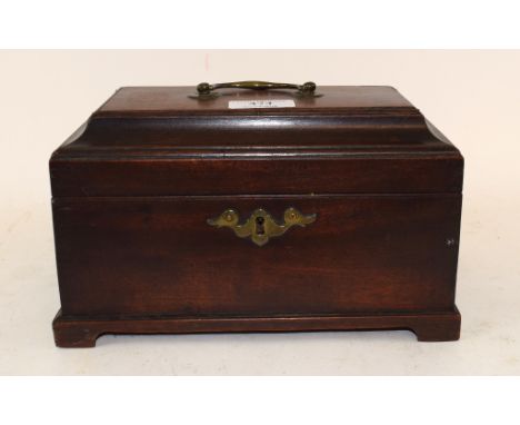 A George III mahogany tea caddy, the interior with three canisters, 24 cm wide Condition report One back hinge poor, a few ar