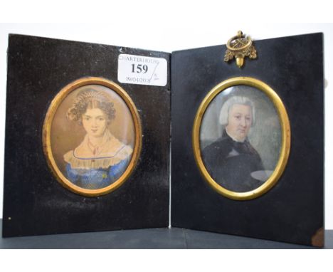 A 19th century oval bust portrait miniature, of a lady, and another, of a gentleman (2) 