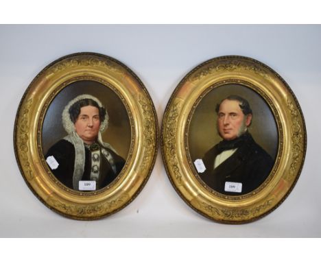 English school, 19th century, an oval bust portrait of a gentleman with sideburns and wearing a cravat, oil on board, 25 x 20