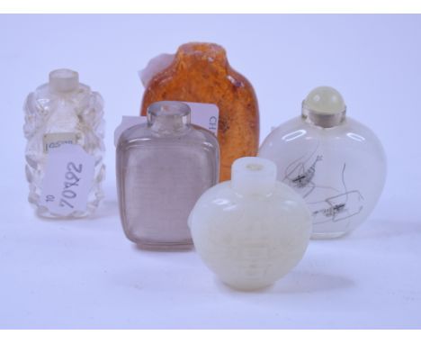 A Chinese rock crystal scent bottle, cracked, 6 cm, and four other scent bottles (5)   Condition report  Report by RBRock cry