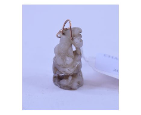 A Chinese mutton fat jade pendant, carved a man, seated, with birds below, 3.5 cm high   Condition report  Report by NGMetal 