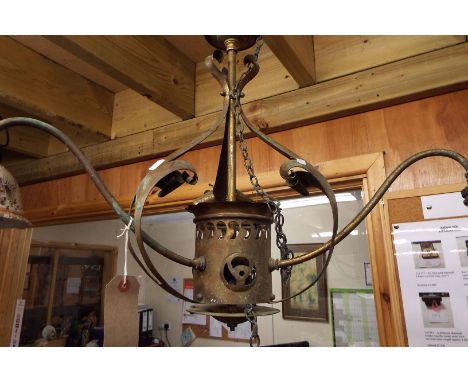 A brass Art Nouveau hanging light fitting in the style of W.S. Benson  needs re-wiring tarnish and pitted but no splits to me