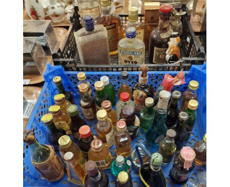 Collection of alcoholic miniature spirits together with some other spirits including: Bell's Scotch Whisky, Napoleon French B