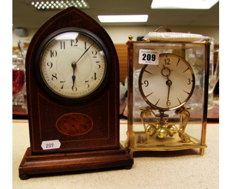 TWO MANTEL CLOCKS being a Kundo 400 Day Clock with rotary pendulum in brass effect and glass case with key and original instr