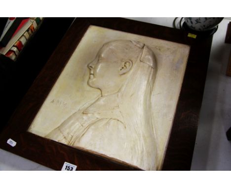 A FRAMED PLASTER RELIEF PORTRAIT entitled 'Amy'
