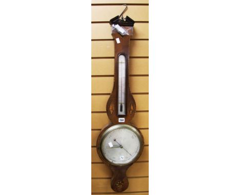 AN ANTIQUE MAHOGANY BAROMETER/THERMOMETER with string decoration to the edge and inlaid decoration with shells and flower hea