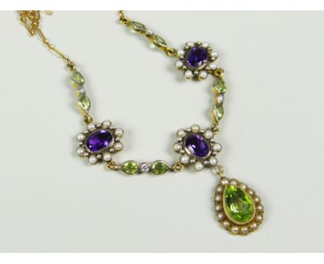 15 CARAT GOLD EDWARDIAN PERIDOT, AMETHYST, PEARL AND DIAMOND NECKLACE with suffragette design in box