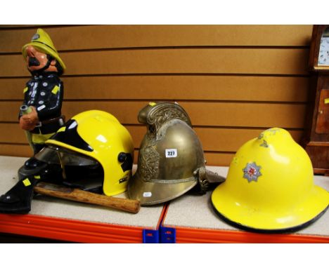 A PARCEL OF FIREFIGHTERS' ITEMS including gilt metal helmet, two modern helmets, garden statue ETC