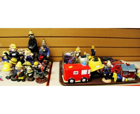 AN ASSORTMENT OF FIREFIGHTER ORNAMENTS INCLUDING Meercats, Beswick figure, novelty teapot and money box ETC