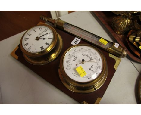 A REPRODUCTION MARITIME STYLE CLOCK AND BAROMETER SET TOGETHER WITH a brass-encased thermometer