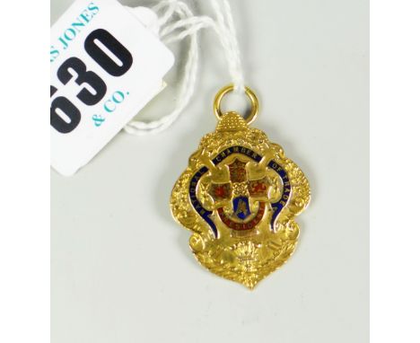 9 CARAT GOLD AND ENAMEL NATIONAL CHAMBER OF TRADE pendant engraved to the reverse 'Arthur McTaggart Short' (Cardiff 1956-57) 