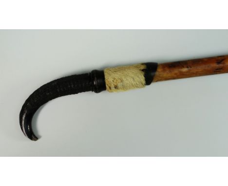 AN INTERESTING VINTAGE ALPINE WALKING STAFF carved with approximately forty Alpine locations such as Engelberg Brunnen etc an