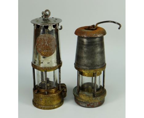 TWO ANTIQUE MINERS LAMPS one being a model by The Wolf Safety Lamp Company and inscribed