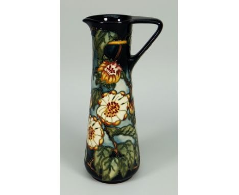 A MOORCROFT POTTERY SLENDER TAPERED JUG limited edition (294/400) unknown pattern signed K Goodwin, 24cms high (boxed)