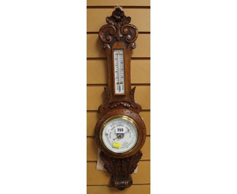 A VINTAGE CARVED BANJO ANEROID BAROMETER 