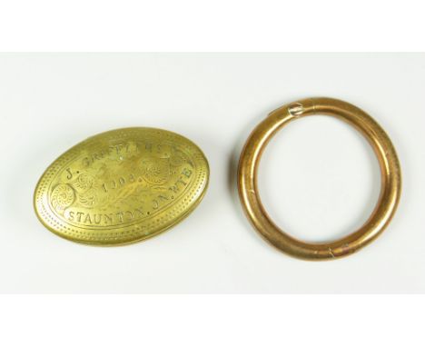 EARLY C20TH BRASS ENGRAVED OVAL SNUFFBOX engraved 'J Griffiths, Staunton on Wye 1908' together with brass type bull ring