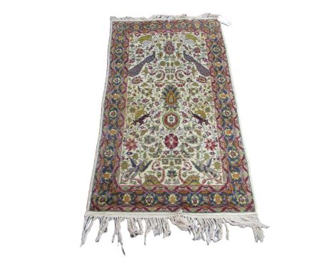Two Persian Tabriz style hand-knotted rugs,194 x 123cm orange border180 x 95cm blue borderOne purchased from Caroline Bosly f