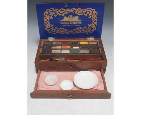 An early 20th century Windsor &amp; Newton artist mahogany travelling box, with fitted interior, to include brushes and ceram