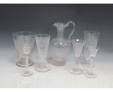 A collection of glasses, to include a large bucket shaped goblet engraved with initials, a pair of George III air twist wine 